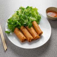 #31 - Chả giò - 4 Egg Rolls · Pork and vegetables wrapped in rice flour wrap and fried. Served with small side of fish sau...
