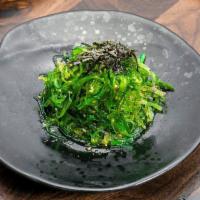 Seaweed Salad (V) · Vegan. Seaweed tossed with roasted sesame seed and sesame oil.