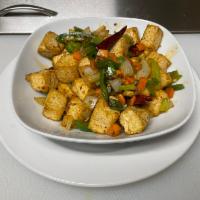 Salt and Pepper Tofu · Served with steamed rice. Spicy.