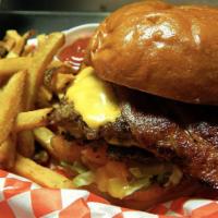 Bacon Cheeseburger · 100% All beef 1/3 lb. patty, bacon, American cheese, and our special garnishes served on a t...