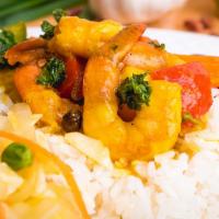 Curried Shrimp · Shrimp sautéed in curry, Jamaican spices and mixed vegetables.