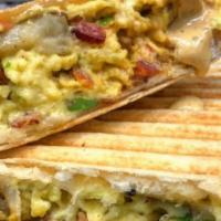 Grilled Breakfast Burrito · Flour tortilla, chipotle spread, eggs, choice of meat, chipotle salsa and pepper jack cheese...