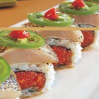 Aloha Roll · Spicy tuna and cucumber on the inside. Topped with albacore and jalapeno.