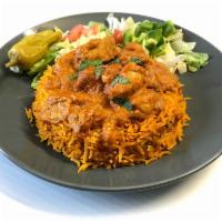 Butter Chicken Platter · Platter includes butter chicken curry over rice, mixed salad toppings and signature green sa...