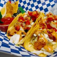Fish Taco · Crispy fish fillet, cabbage, pico de gallo and Ranger sauce on two warm yellow corn tortilla...