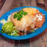 Chili Relleno · A stuffed poblano pepper, topped with ranchero sauce & white cheese, served with guacamole.