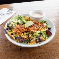 Southwest Chicken Salad · Mixed greens, grilled chicken, corn, black beans, cheddar cheese, avocado and tortilla crisp...