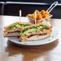 Turkey BLTA Sandwich · Sliced turkey breast, bacon, lettuce, tomatoes, and avocado with pesto mayo served on your c...