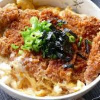 R1. Katsudon Rice Bowl · Steamed rice bowl topped with pork cutlet, onion, green onion, egg, soy sauce, kizami nori w...