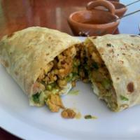 Burrito · Adobada, birria, carne asada, carnitas or chicken and pico de gallo, guacamole and beans.