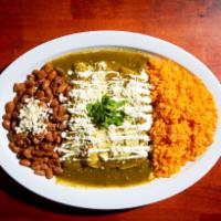 Veggie Enchilada Plate · 3 enchiladas filled with sauteed onions, bell peppers, potatoes, queso fresco, guacamole, ri...
