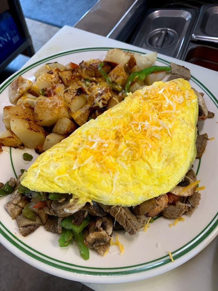Tri-Tip Omelette Plate · Tri-tip, onion, tomato, bell pepper, mushroom, topped with mix cheese.