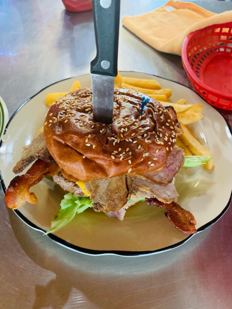 Willy Mammoth Burger · Tri-tip topped with lettuce, tomato, pickles, onion, BBQ sauce and an onion ring.