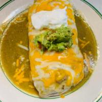 Nopales Burrito · Cactus, onion, jalapenos, tomato and eggs, topped with chile verde sauce topped with Jack ch...