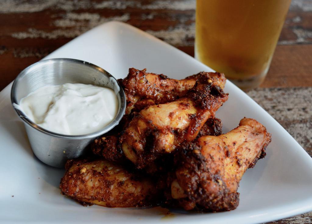 Smoked Wings · 6 or 10 wings tossed in house rub served with choice of ranch or blue cheese dressing.