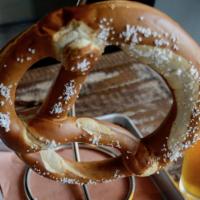 Bavarian Pretzel · Handcrafted soft pretzel with beer cheese and mustard,