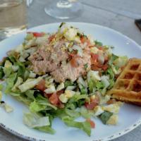 Salmon Salad · WRB smoked salmon salad over a bed of romaine lettuce topped with tomatoes, boiled eggs, and...