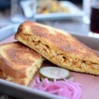 Grilled Mac & Cheese Sandwich · Macaroni pasta in a cheese sauce.