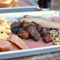 3 Meat Sampler Plate · Try a sample of our signature smoked meats: sliced brisket (4 oz), burnt ends (6 oz.) and sm...