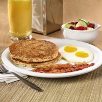 Hearty 9-Grain Pancake Breakfast  · Multigrain wheat pancakes made with flaxseeds, cinnamon & brown sugar. Served with eggs, has...