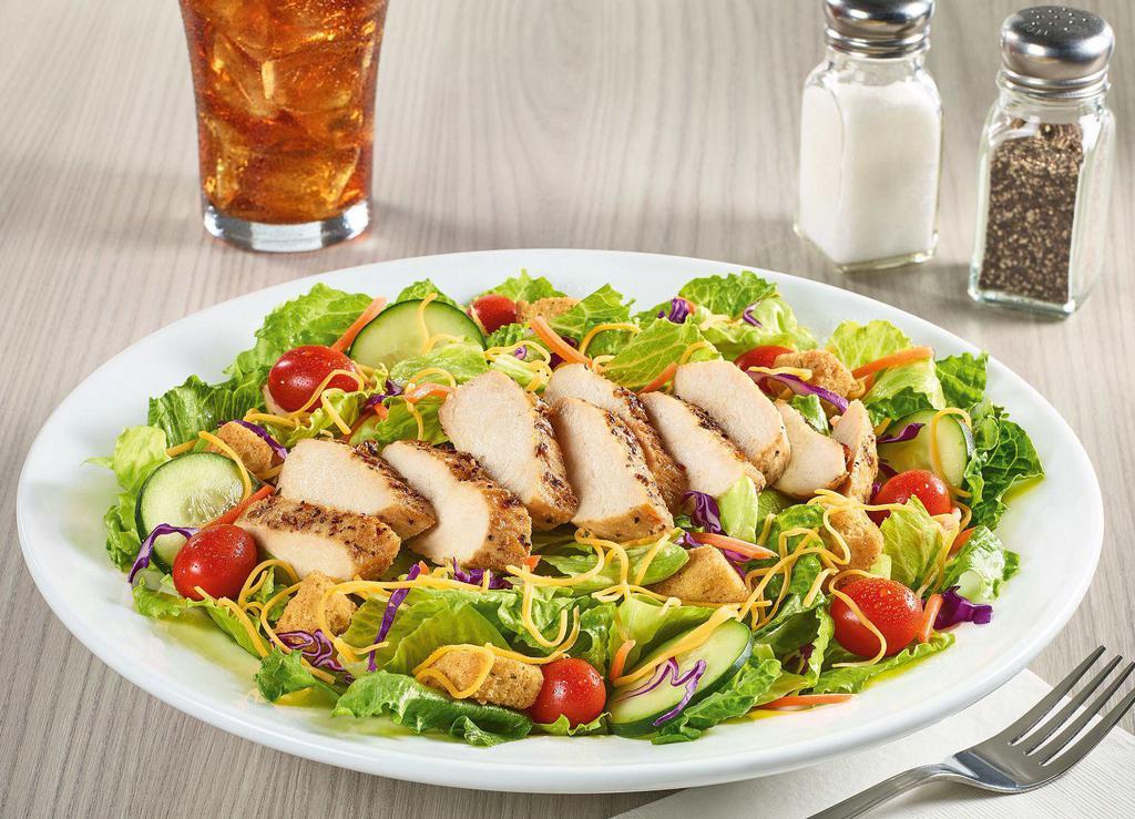 House Salad · Cucumbers, grape tomatoes, Cheddar cheese and croutons atop a bed of iceberg mix. Served with your choice of dressing.