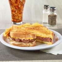 NEW! Diner Classic Patty Melt · A 100% beef patty with caramelized onions, Swiss & American cheeses and Diner Q sauce on gri...
