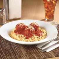 Brooklyn Spaghetti & Meatballs  · Seasoned meatballs atop a bed of pasta covered in tomato sauce and served with dinner bread....
