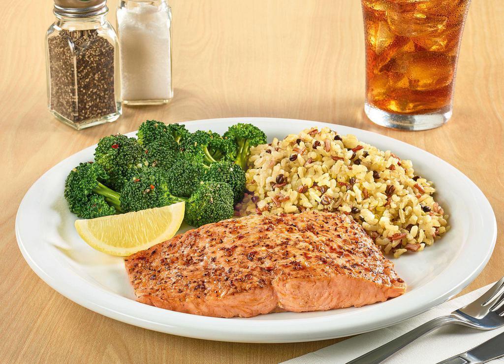 New! Wild Alaska Salmon · A grilled wild-caught Alaska salmon fillet with a delicious blend of garlic & herbs. Served with two sides and dinner bread.                        