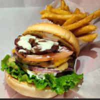 B19. Monster Burger · Beef Patties, Cheddar & Swiss Cheese, Bacon, Pastrami, Turkey, Tomato, Onion, Lettuce
