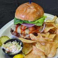 Sriracha Burger · A spicy burger grilled your way then topped with pepper jack cheese, jalapeno bottle caps th...