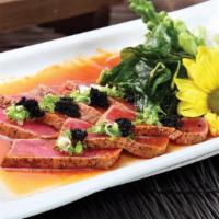 E8. Tuna Popeye · Seared tuna steak, served with crispy spinach and spicy miso sauce. Scallion and tobiko on t...