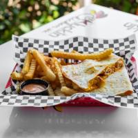 Kluckin Quesadilla · Chicken Tender chopped up to your heat level, with Monterey Jack , cheddar cheese and Klucki...