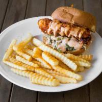 Kluckin Sandwich · Served on your choice of French Roll, or Gourmet Bun with Slaw and Pickles.