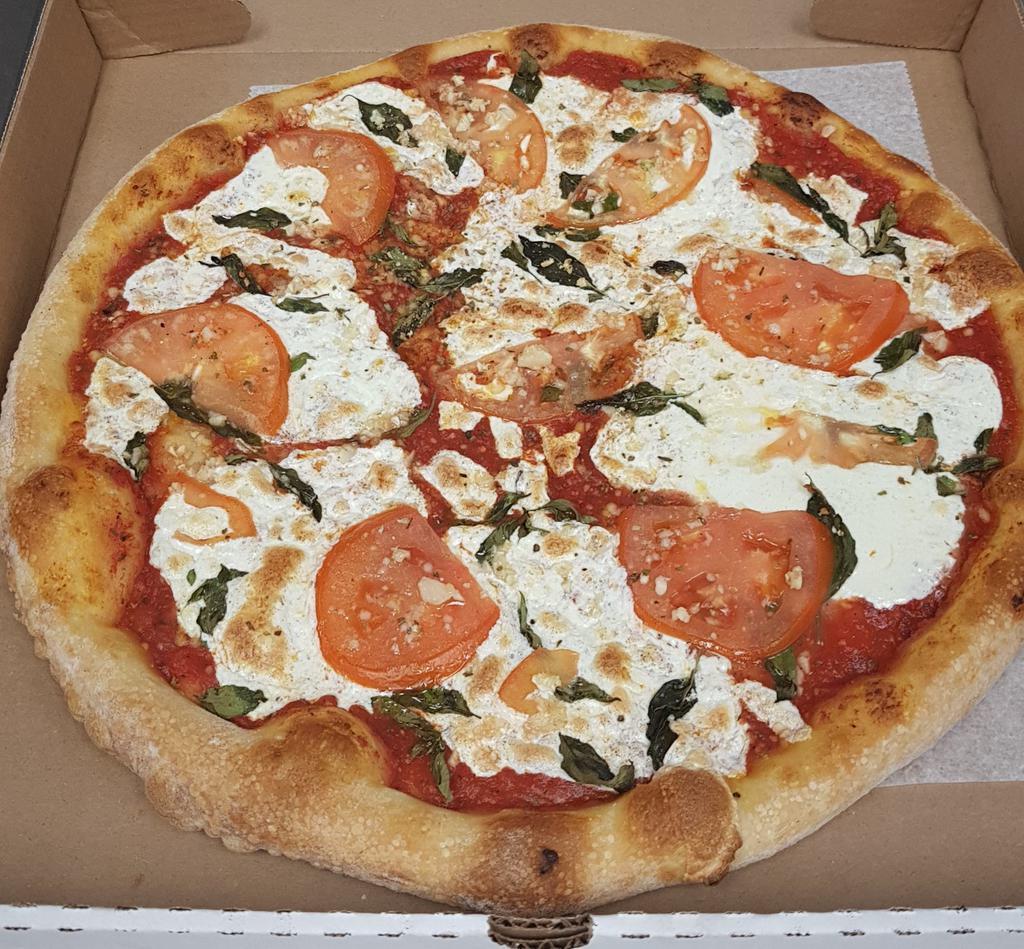Margherita Pizza · Fresh mozzarella cheese, sliced tomatoes, fresh basil, and garlic.