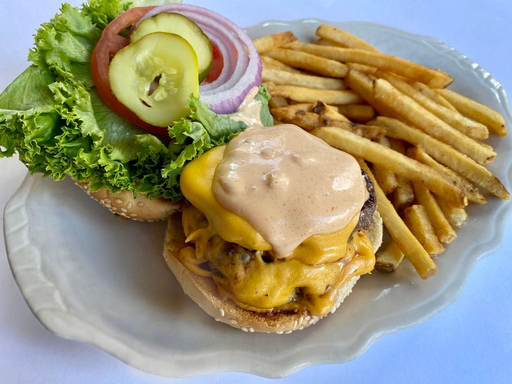 Double Cheese Burger · Two 4 oz. Pat Lafrieda Patties, American Cheese,
Secret Sauce, Lettuce, Tomato, Red Onion, Martin’s Sesame Bun
