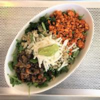 Burrito Love Salad Bowl · Kale, arugula, jicama, chimichurri, black beans, quinoa, guacamole, and spicy tempeh with sw...