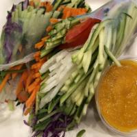 Vegetable Spring Roll · Rice paper, jicama, cabbage, carrots, avocado, peppers, and carrot-ginger dressing.