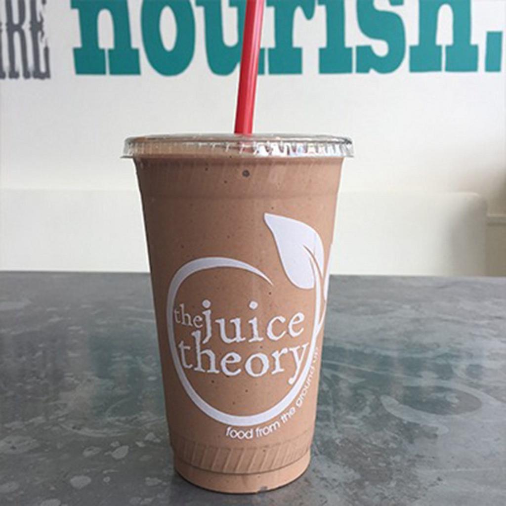 Monkey Swirl Smoothie · Coconut meat, banana, Medjool dates, almond butter, cacao powder, plant protein, and homemade almond milk.