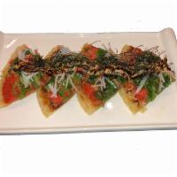 Tuna Pizza · Spicy tuna, seaweed salad and crab meat on top of the pancake. Hot and spicy.