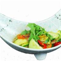 Cucumber Salad Thai Style · Chef-selected garden fresh cucumbers, onions, scallions, bell peppers, mint and cilantro, mi...