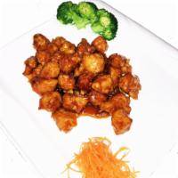 General Tso's Chicken · Served crispy in tangy orange sauce. Served with white rice or brown rice.