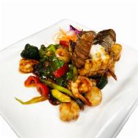 Thai Spiced Lemongrass Seafood · Shrimp, flounder, scallops, lobster and vegetables. Served with white rice or brown rice. Ho...