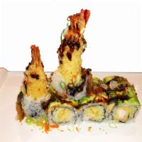 Dancing Eel Roll · Shrimp tempura inside eel, avocado, scallion, masago and eel sauce outside.