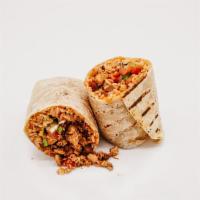 Chicken Burrito · Marinated grilled chicken, Spanish rice, pinto beans, salsa verde, cilantro, and house salsa.