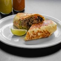 Carnitas Burrito · Large flour tortilla filled with rice, black beans, lettuce, pico de gallo, cheese, and meat.