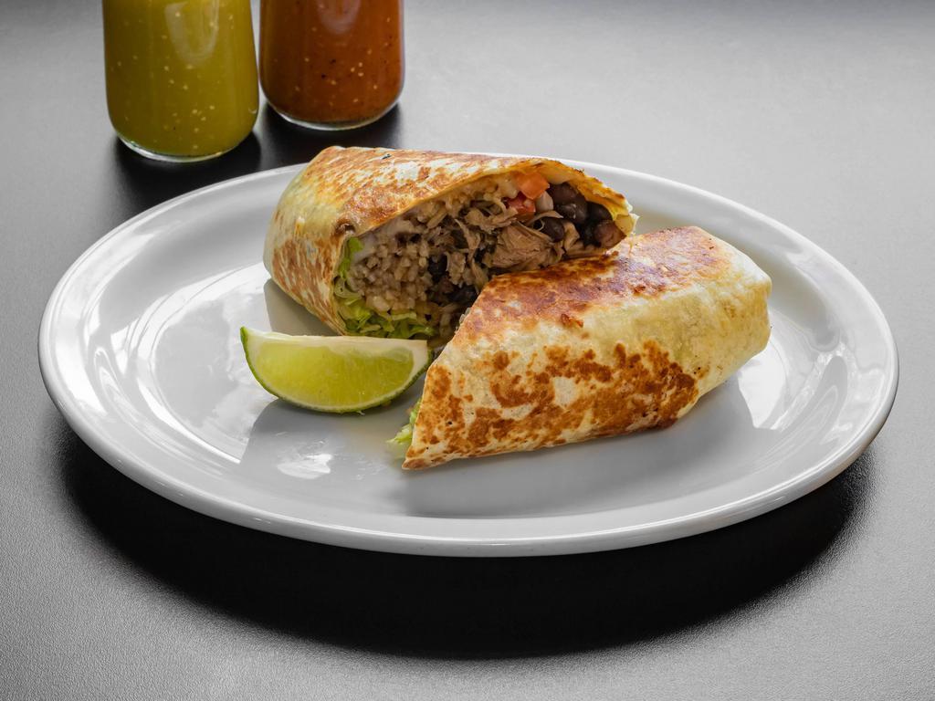Carnitas Burrito · Large flour tortilla filled with rice, black beans, lettuce, pico de gallo, cheese, and meat.