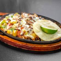 Steak Alambre · Diced steak, chorizo, bacon, bell peppers, onions topped with melted cheese served with a si...