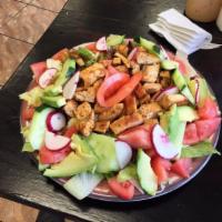 Chicken Salad · Grilled and sliced chicken over salad base are comprised of mixed greens, onions, bell peppe...