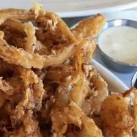 Fried Onion Strings · Hickory BBQ sauce and buttermilk ranch.