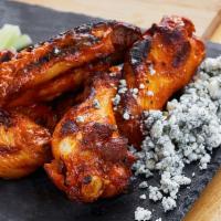 Hot Wings · Sweet Sriracha or Buffalo-style, celery and dipping sauce.